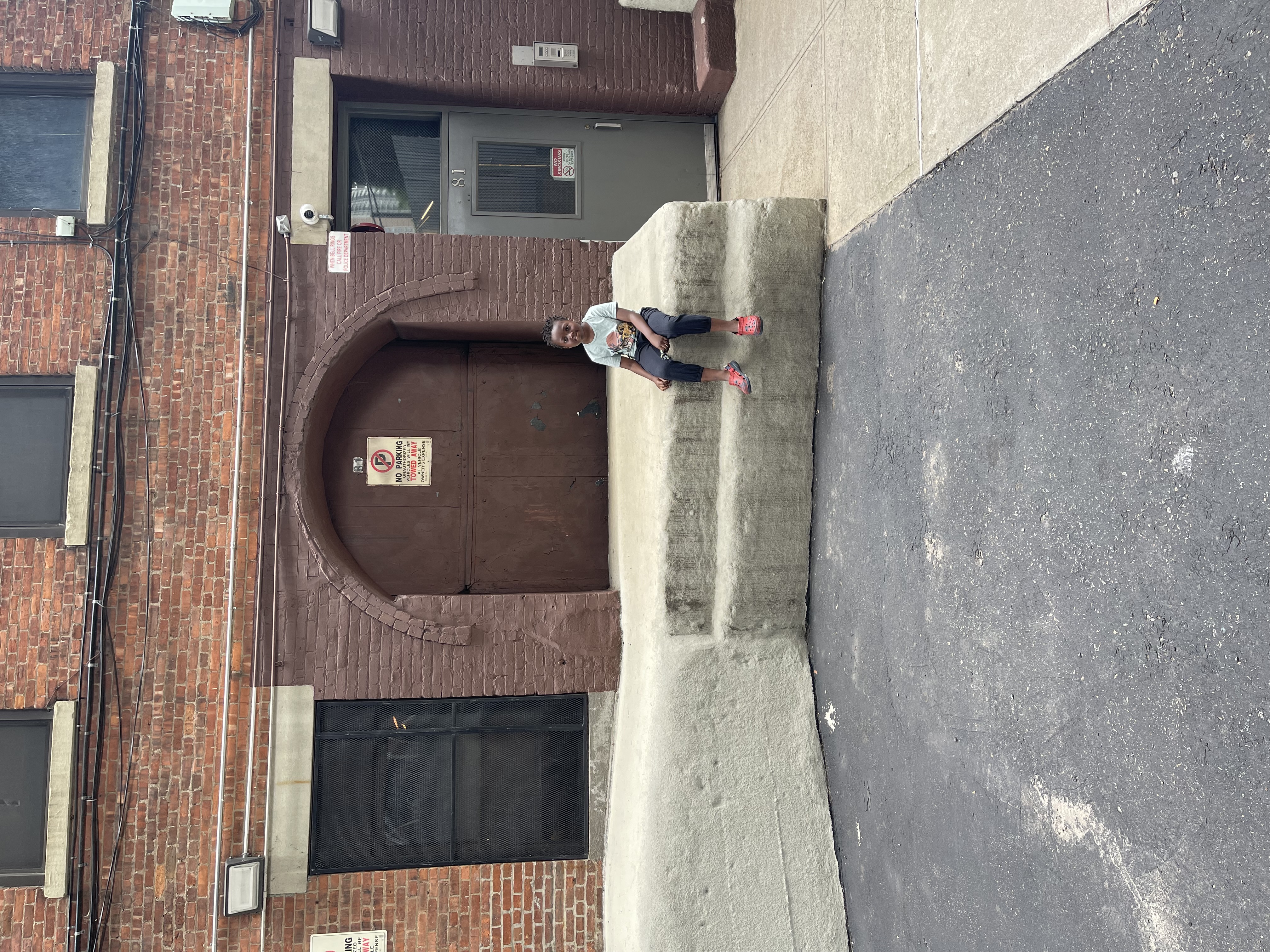 A child playing with building blocks or drawing.